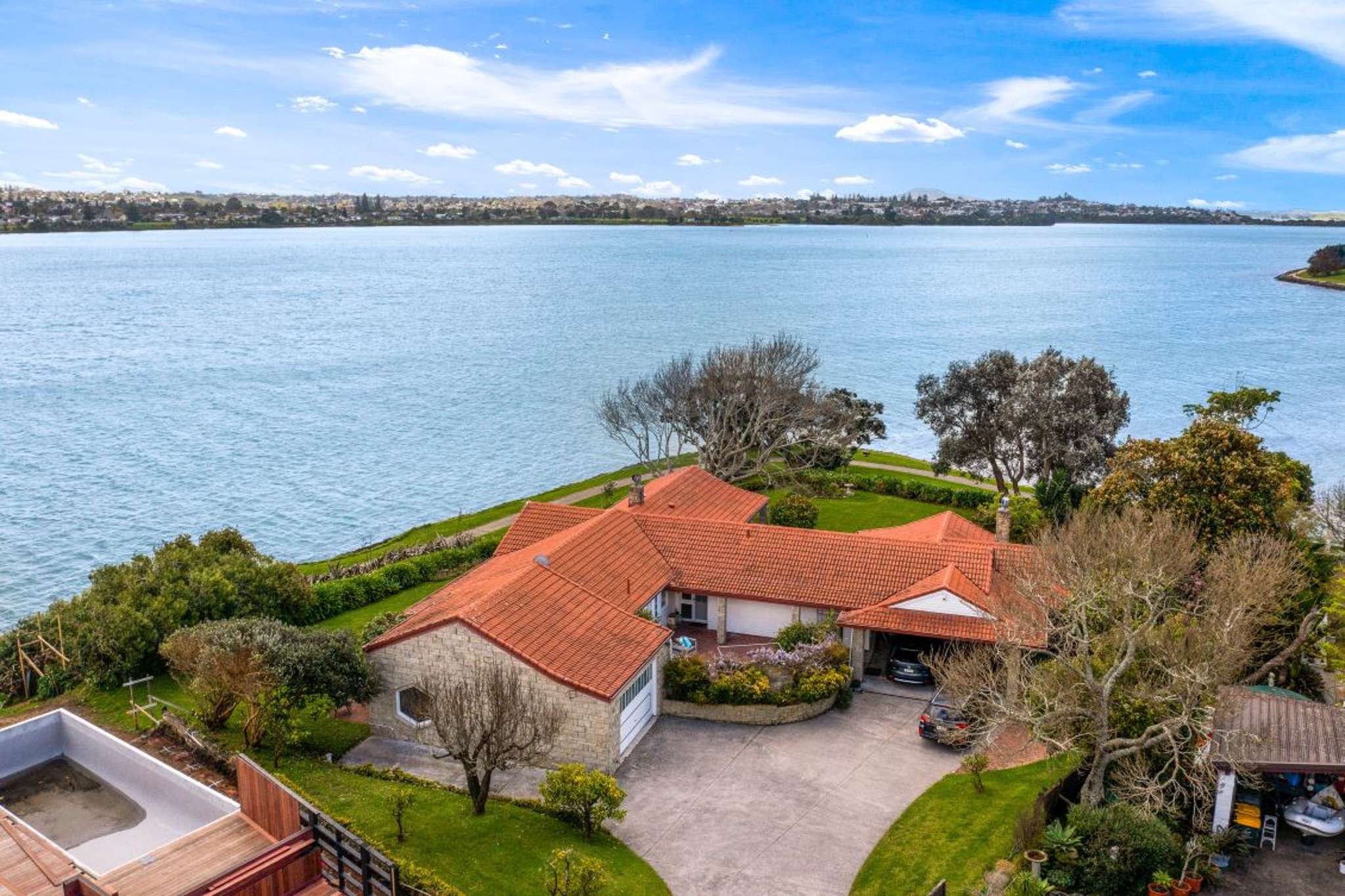 Waterfront home on half-acre block has front-row seats to sailing action