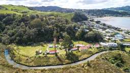 Could you get more classic Kiwiana:  Whitianga campground for sale