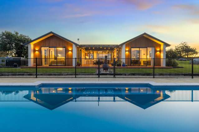 Luxury living, land and a pool!