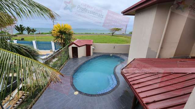 STEPS TO THE BEACH from this HUGE NEW CONSTRUCTION DOUBLE-STORY HOME in OLOSARA (SIGATOKA)!