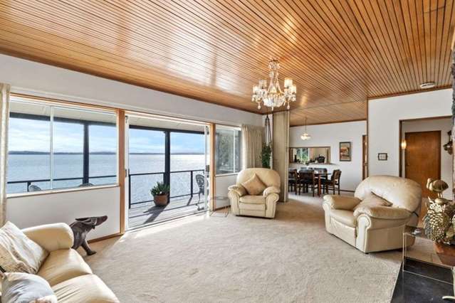 Waterfront home built for Kiwi sailing legend James Davern up for grabs