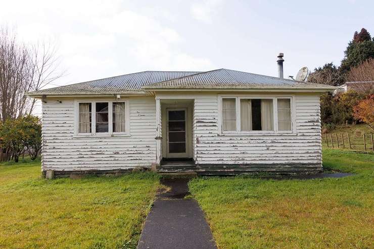 The fire-damaged home on Awakino Road in Te Kuiti sold for <img11,250. Photo / Supplied