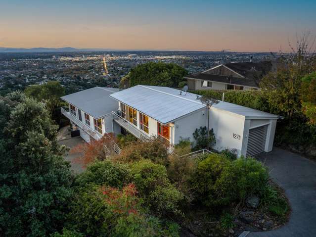 Rare Dual-Dwelling Gem with Four Car Garaging