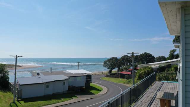 Sea views, stunning home, walk to the beach