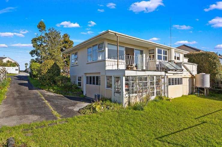 five-bedroom brick family home on Hyperion Drive, in Randwick Park, South Auckland