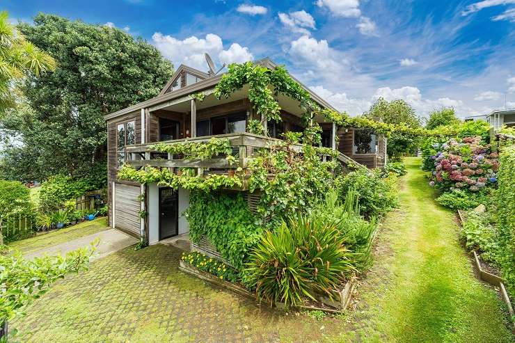 The two-bedroom, two-bathroom holiday home at 123 Okapu Place, in Aotea, has been described as the best home for many miles. Photo / Supplied