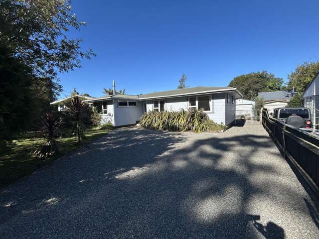 Enjoy the Good Life – Home with Greenhouse, Coop & Entertaining Area