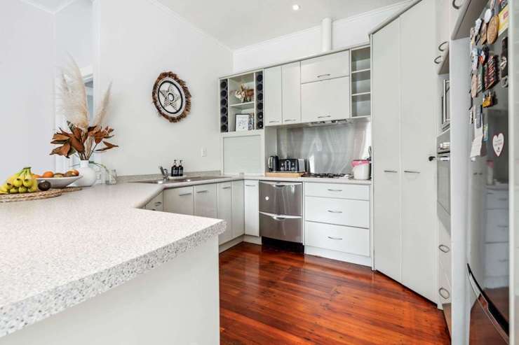 A three-bedroom, one-bathroom home on Grand Vue Road, in Papatoetoe, sold under the hammer for <img.8655m after some competitive bidding. Photo / Supplied