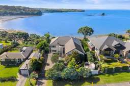 Covid couple’s luxury clifftop Whangaparāoa retreat goes to auction