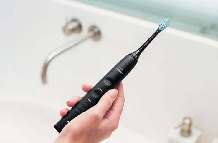 Electric toothbrushes can make a real difference, but technique still matters most, experts say. Artwork / Beth Walsh