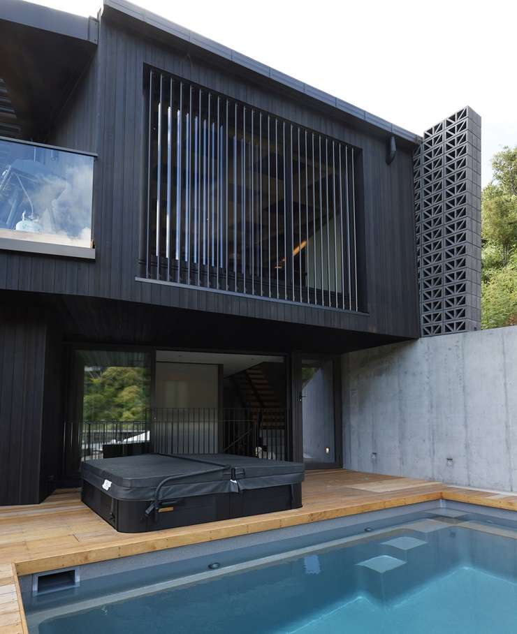 One of the listing photos from the Waiheke Island home that appeared on Grand Designs New Zealand. The house was incomplete at the time, so the listing used renders. Photo / Supplied
