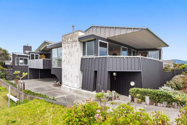 Last Call for this Stunning Coastal Masterpiece!