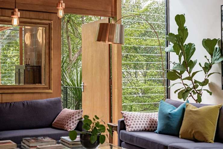 The award-winning four-bedroom home tucked into the bush on Kelvin Road, in Auckland's Remuera, fetched $2.5m. Photo / Supplied