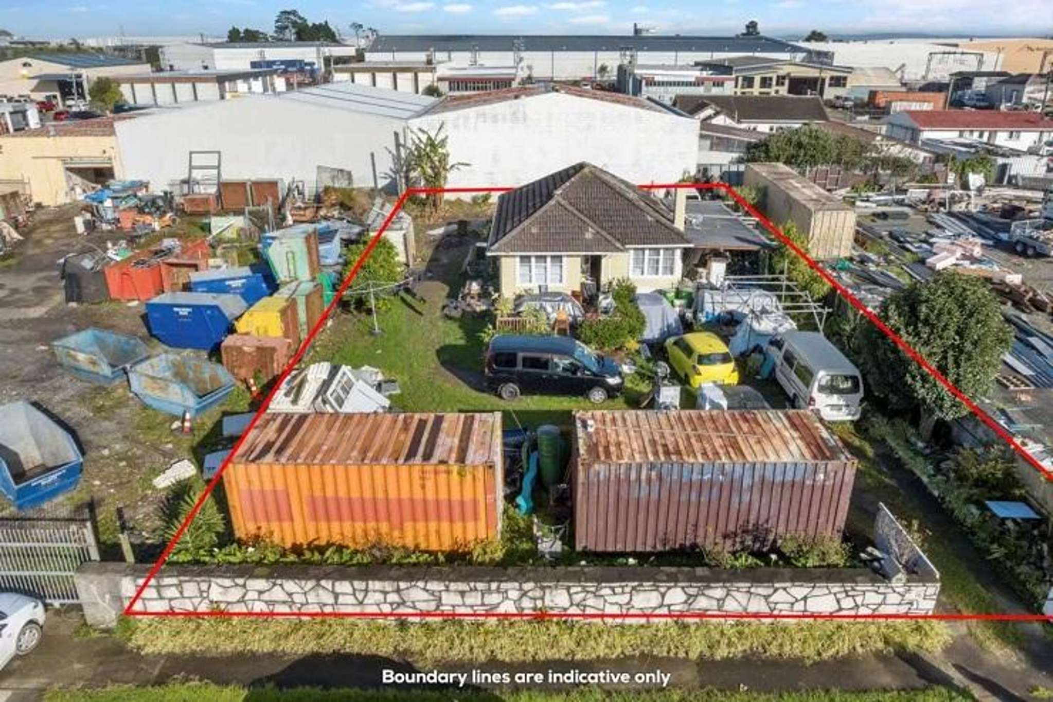 House surrounded by skips and scaffolding sells for $1.136m