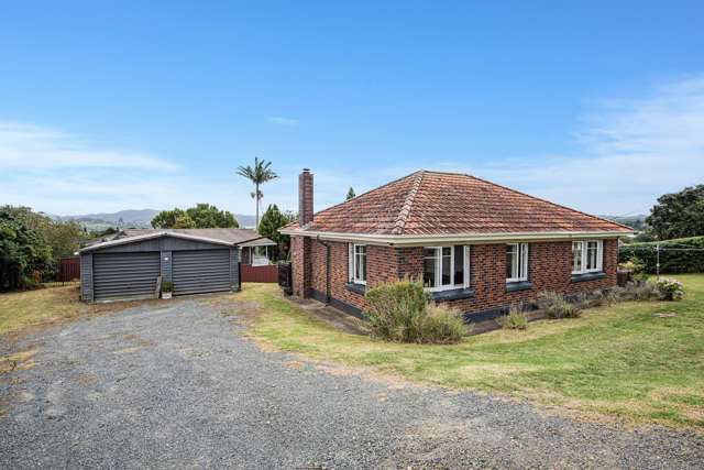 Solid 1950s brick. Big land. Bigger options...