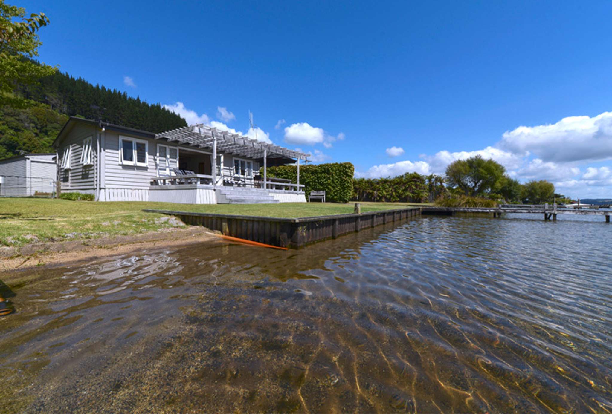 ‘Frantic’ bidding fight sees Lake Rotoiti cottage sell for $3.425m – almost $2m above RV