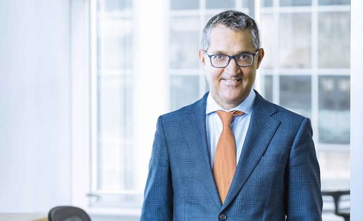 Baches line Onetangi Beach on Waiheke Island. Photo / Getty Images