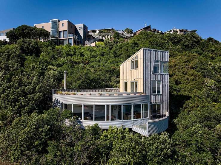 This Owhiro Bay Parade home in Wellington’s Ōwhiro Bay, was designed by award-winning architect Roger Walker. Photo / Supplied