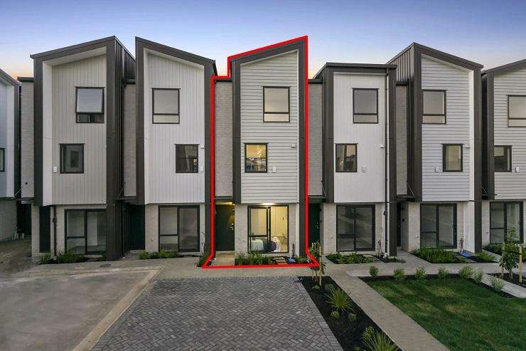 Houses under construction in Westgate, Auckland. The suburb is one of several that have seen a surge in new home listings. Photo / Alex Burton