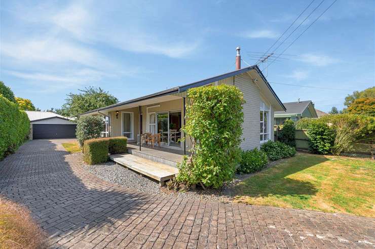 Bidding on this four-bedroom home on Mount Pleasant Road, Mount Pleasant, Christchurch, started at $750,000 and ended in a sale at <img.11m. Photo / Supplied