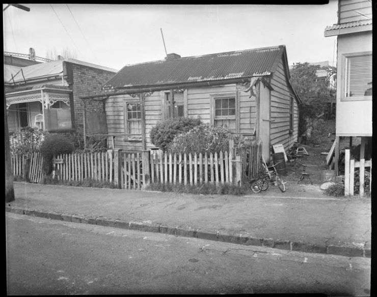 The two homes for sale at 37 and 39 Spring Street, in Auckland's Freemans Bay, are sandwiched between commercial buildings, reminiscent of the Pixar movie Up. Photo / Supplied