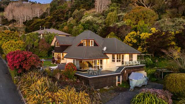 Sun-filled family home with sea and mountain views