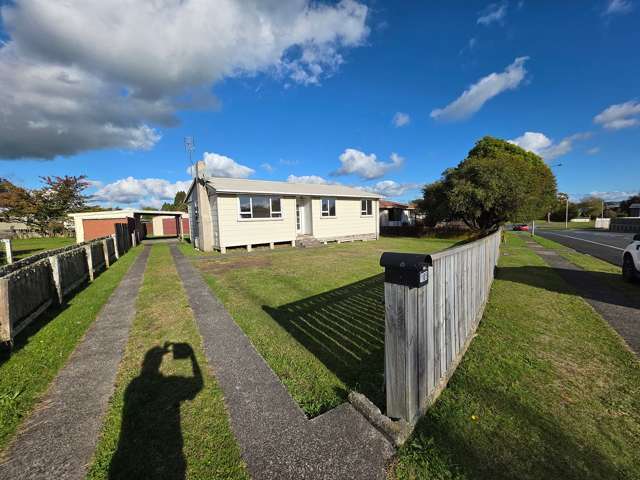 Fully fenced with large garage