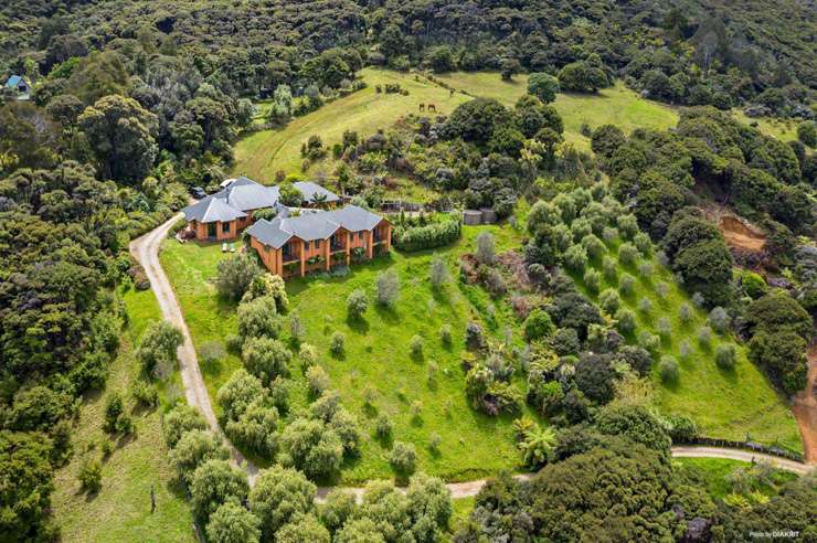 The four-bedroom house on Whangaparapara Road, Great Barrier Island, was on the market at <img.4m. Photo / Supplied