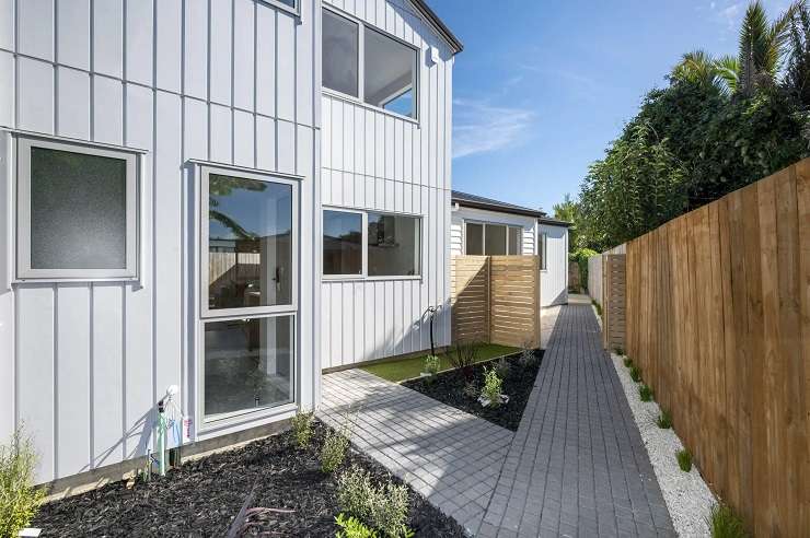 Houses under construction in Westgate, Auckland. The suburb is one of several that have seen a surge in new home listings. Photo / Alex Burton