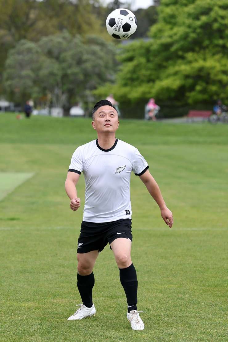 Barfoot & Thompson agent Lawrence Yuan and his seven-year-old son Elton. Photo / Fiona Goodall