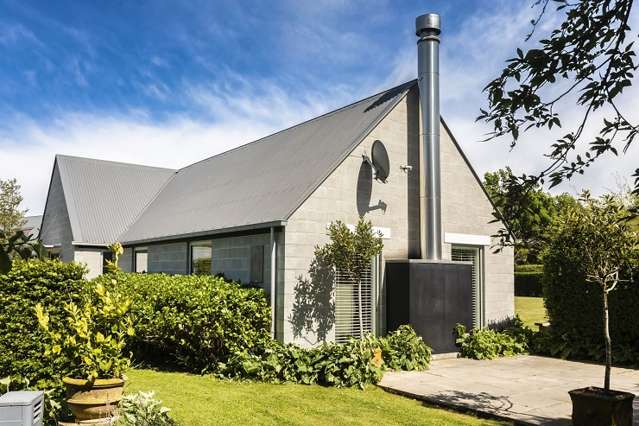 Retirees ditch the motorhome, pay $1.45m for ‘dream’ concrete block home