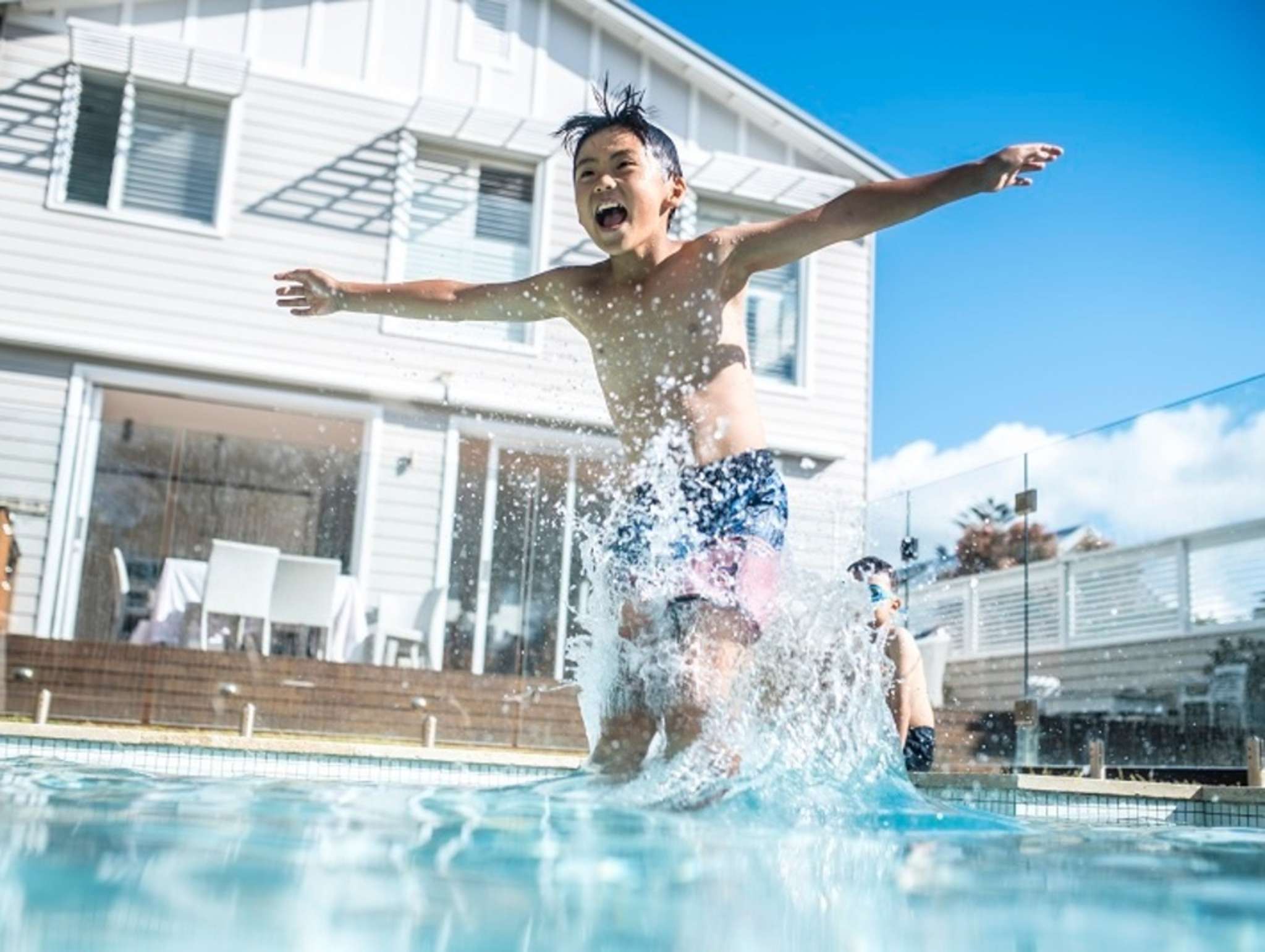 The lure of the backyard swimming pool
