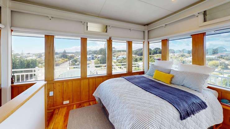 Darren Harrison's unusual home at 112 Kahukura Avenue, in Waitarere Beach, has been a labour of love. Photo / Supplied