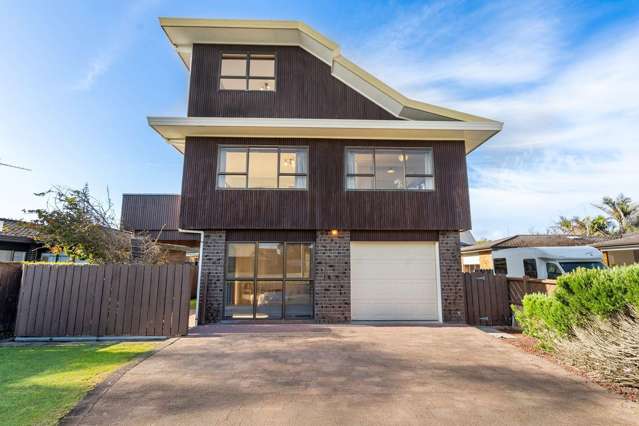 Just 100m from Orewa Beach Ã¢ÂÂ Spacious Coastal Living