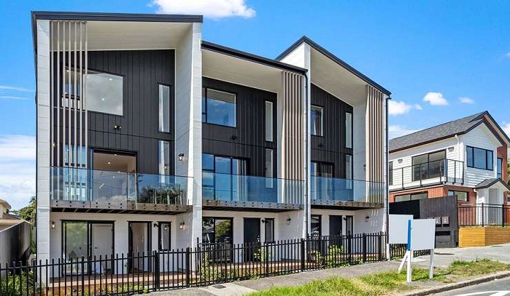 This three-bedroom house on Don Buck Road, in Massey, Auckland sold for $990,000. Photo / Supplied