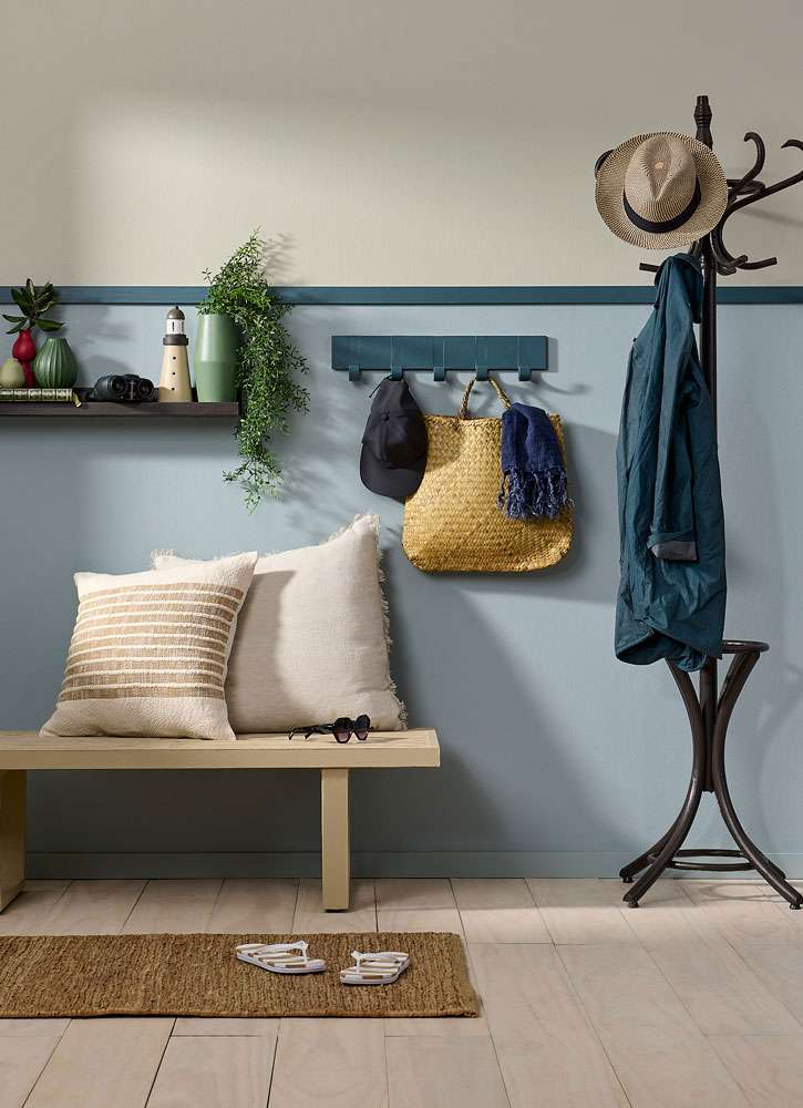 A natural toned colour palette, making use of Resene Colorwood washes and stains seamlessly connects this sitting room with the outdoors. Project by Vanessa Nouwens, image by Bryce Carleton.