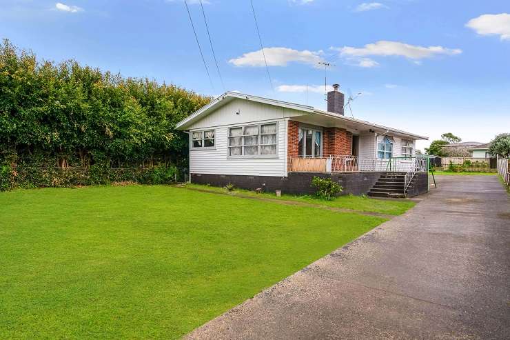 A four-bedroom bungalow on a corner site in Avondale, Auckland, sold for <img.321m under the hammer. Photo / Supplied