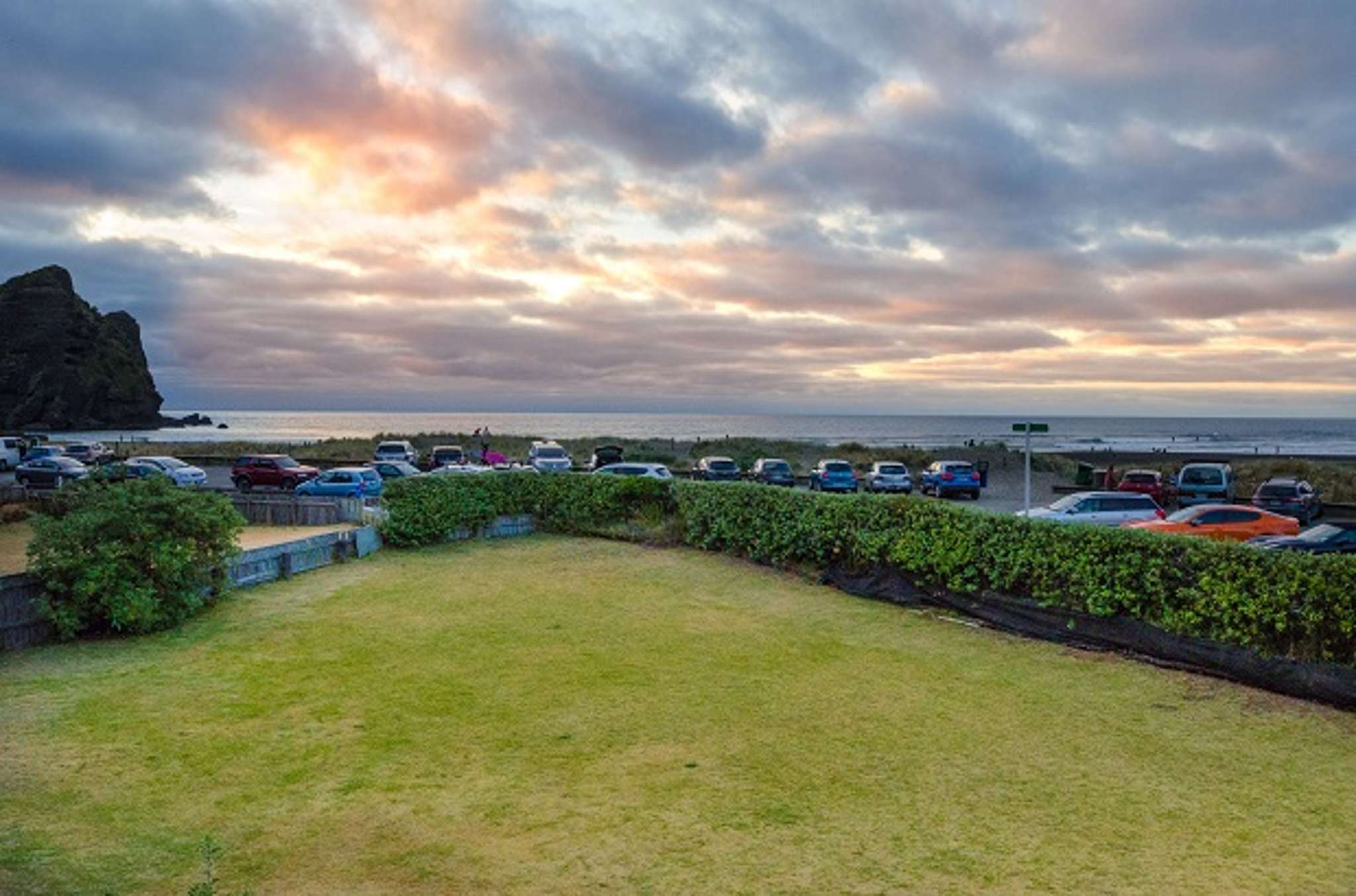 Watch the world's best surfers from your Piha bach front lawn