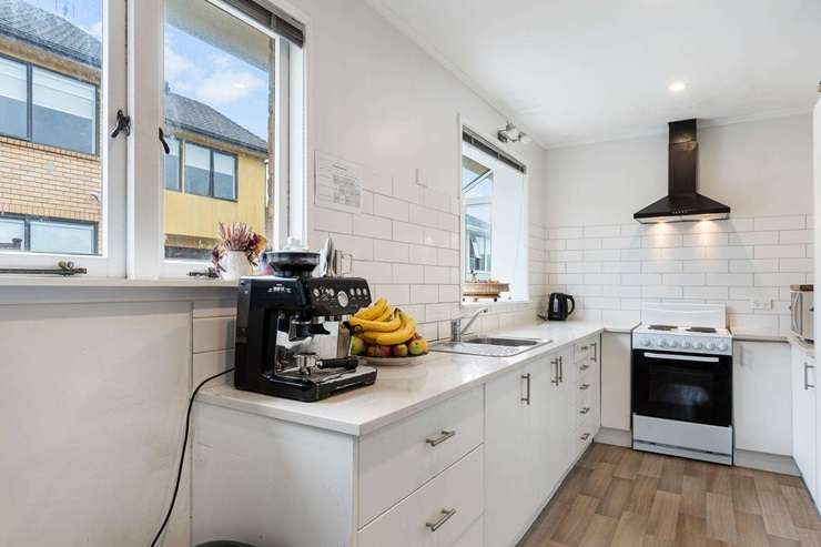 A brick and tile home on Arundel Street, in Mount Roskill, sold for $2.115m after a bidding war broke out between developers. Photo / Supplied