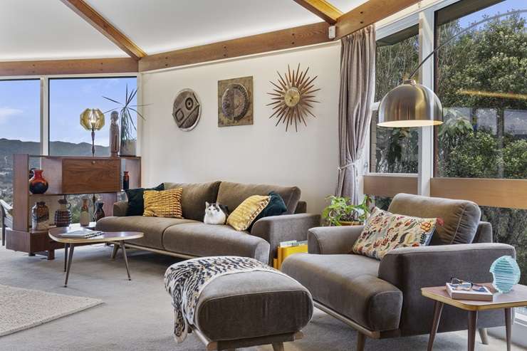 A young family has bought the mid-century house on Gurney Road, in Kelson, Lower Hutt, which looks as if a UFO has landed on the hill. Photo / Supplied