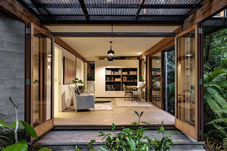 The award-winning four-bedroom home tucked into the bush on Kelvin Road, in Auckland's Remuera, fetched $2.5m. Photo / Supplied