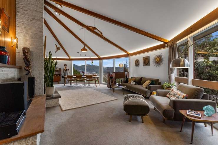 The mid-century house for sale at 26 Gurney Road, in Kelson, Lower Hutt, looks as if a UFO has landed on the hill. Photo / Supplied
