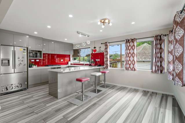 House with Home and Income Potential!