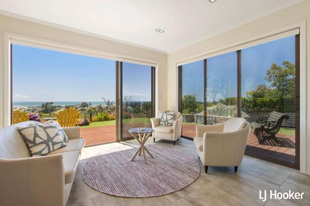 Elevated Coastal Retreat with Breathtaking Views