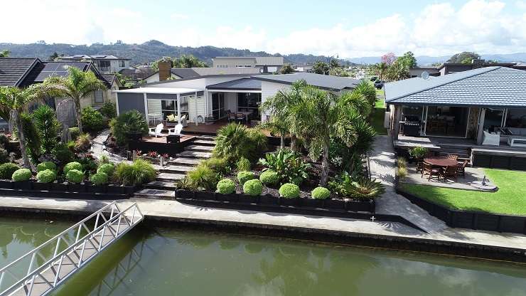 Canal front properties in Whitianga Waterways such as this new build on Awatea Drive fetch premium prices. Photo / Supplied