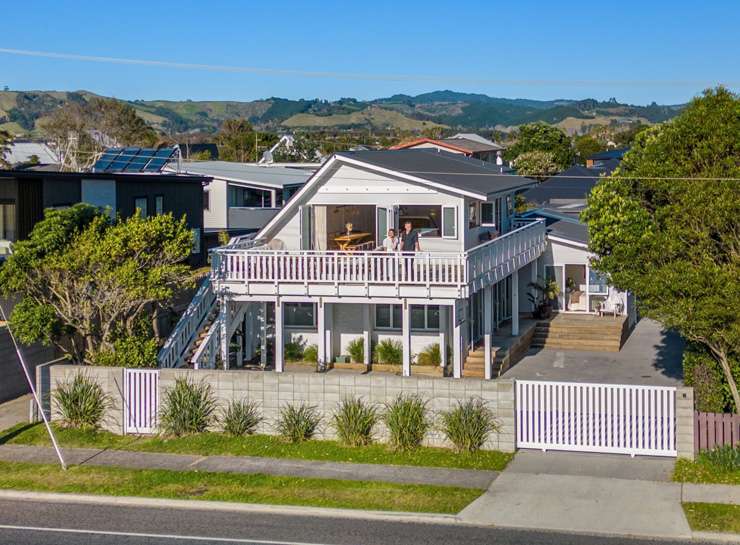 The listing for this three-bedroom do-up home on Wyllie Road, in Papatoetoe, Auckland, made clear the owner was going to auction to sell. Photo / Supplied