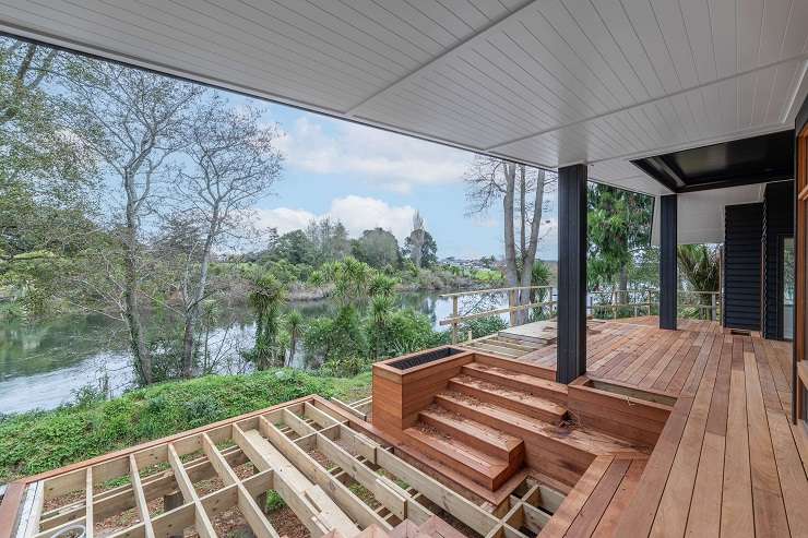 An architecturally-designed new build at 1027 River Road, in Queenwood, Hamilton, is only three-quarters complete. Photo / Supplied