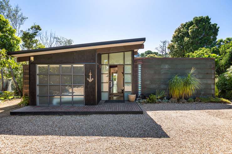 A four-bedroom house on Hill Road, in Palm Beach, with views of the beach and Hauraki Gulf, sold under the hammer for $6.031m. Photo / Supplied