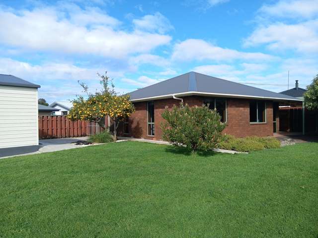 Central Location! Garaging Galore!