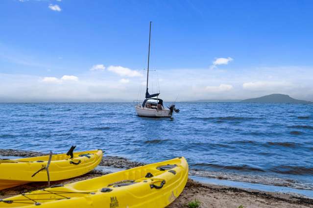 Lakefront Living with Endless Potential